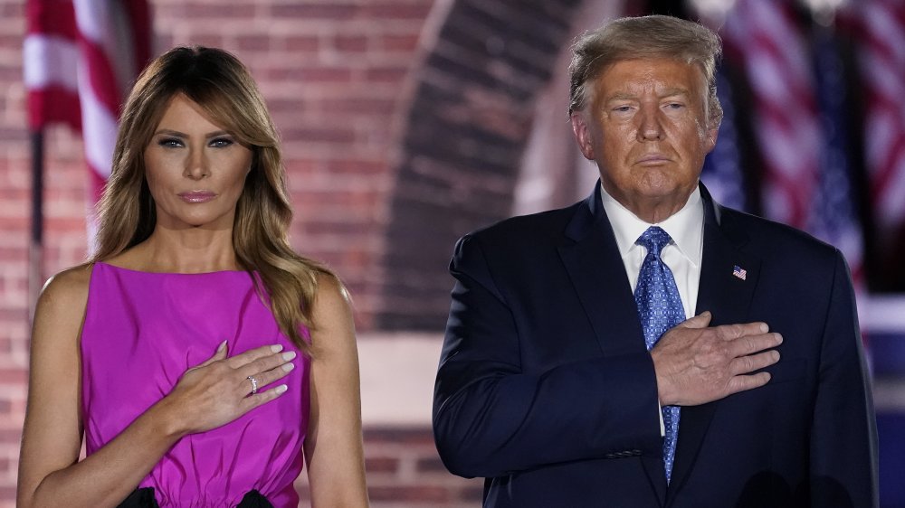 Melania Trump and Donald Trump both pledging