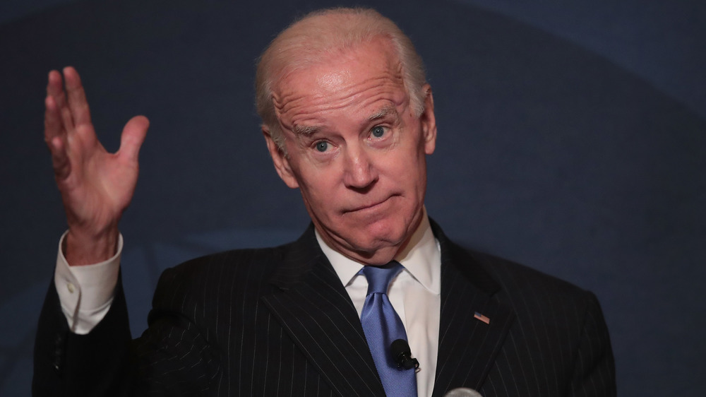 Joe Biden shrugging while speaking