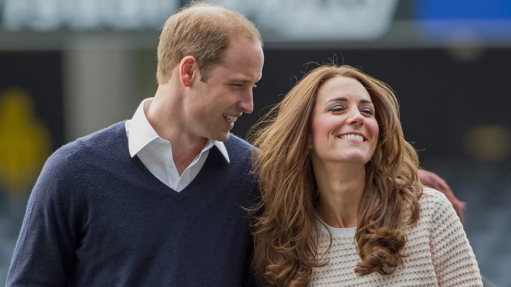 Prince William and Kate Middleton walking arm in arm