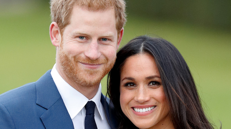 Meghan Markle, Prince Harry, both smiling