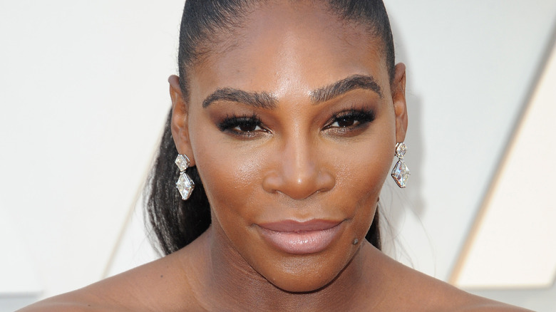 Serena Williams, 2019 photo, wearing makeup, hair up in pony tail