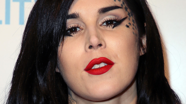 Kat Von D wearing red lipstick