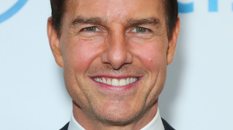 Tom Cruise grinning