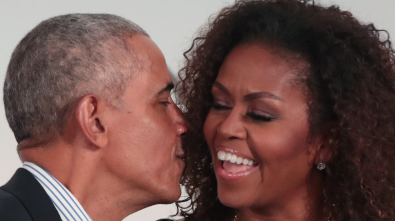 Barack Obama kisses wife Michelle