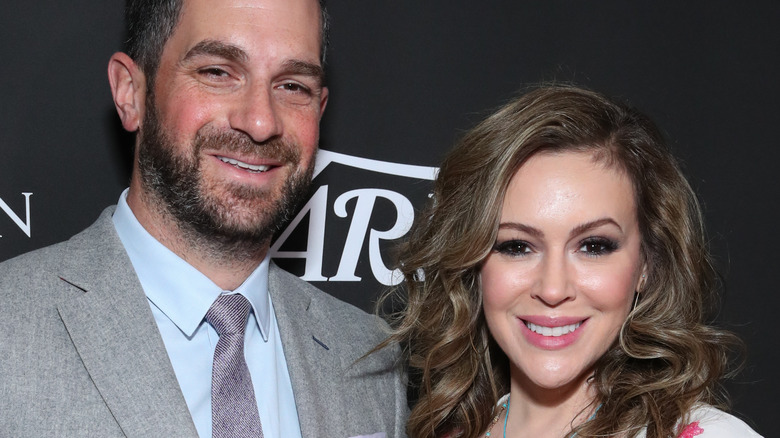 Alyssa Milano and her husband David Bugliari at event