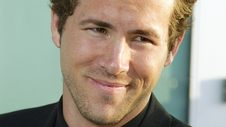 Ryan Reynolds smiling wryly