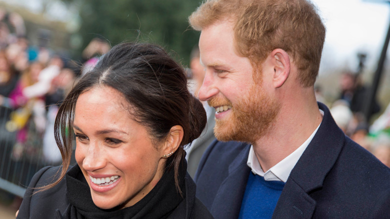 Meghan Markle and Prince Harry smiling