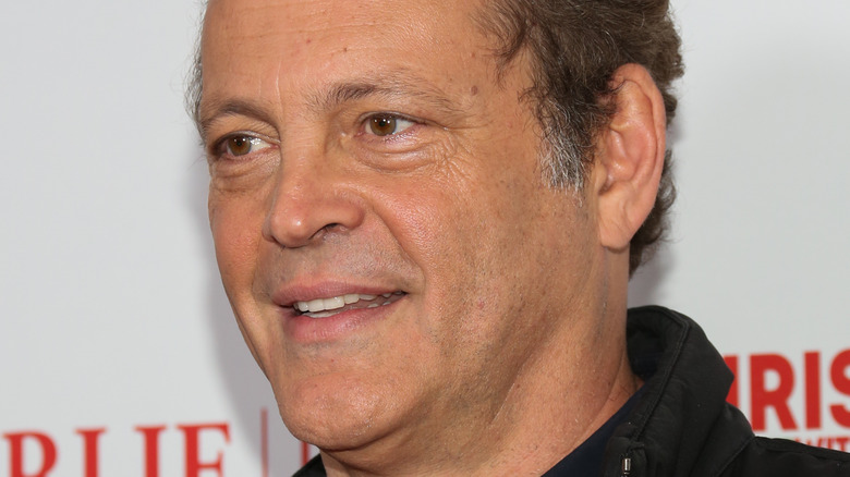 Vince Vaughn smiling on a red carpet in 2022