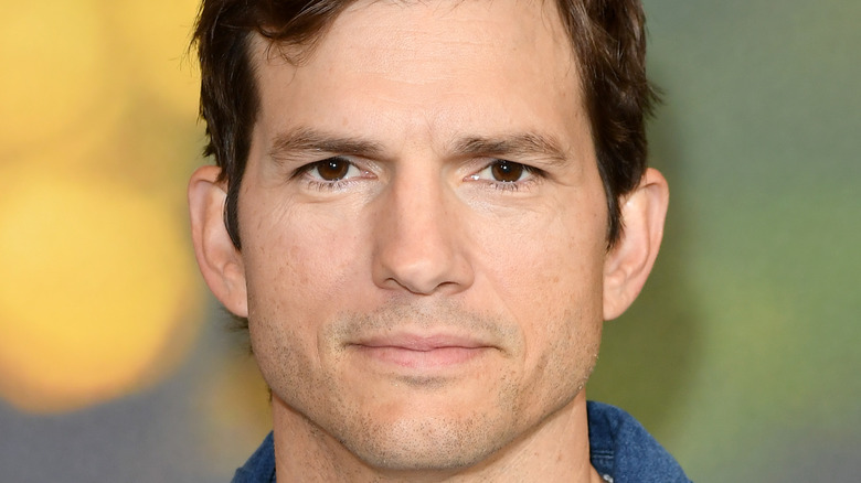 Ashton Kutcher looking at camera