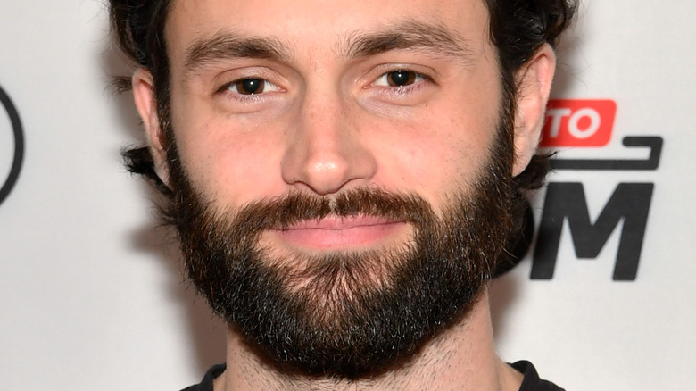 Penn Badgley with a full beard