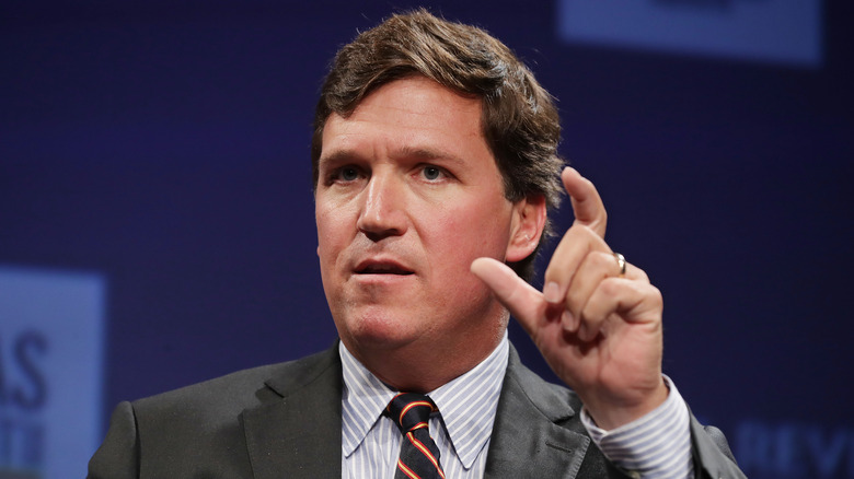 Tucker Carlson gesturing