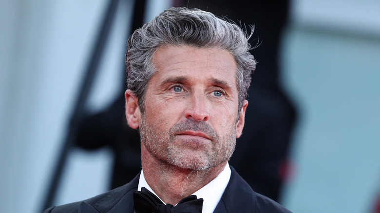 Patrick Dempsey posing on a red carpet