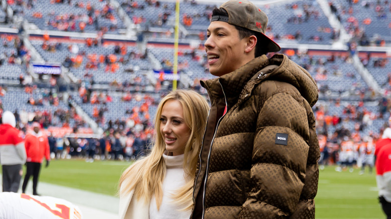 Brittany Mahomes posing with Jackson