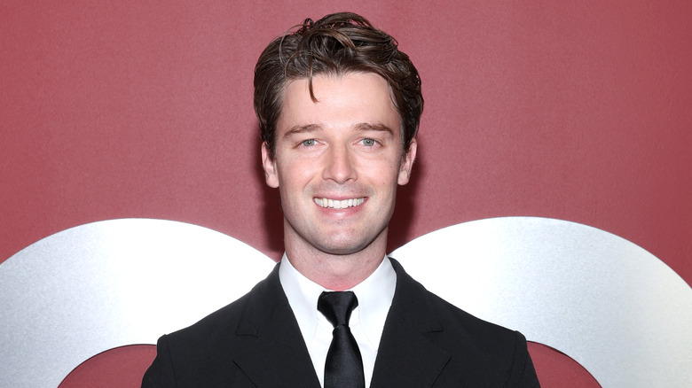 Patrick Schwarzenegger smiling