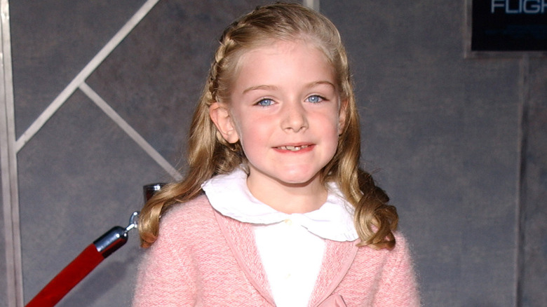 Marlene Lawston smiles at a red carpet event