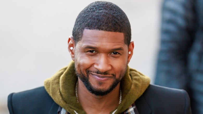 Usher smiling