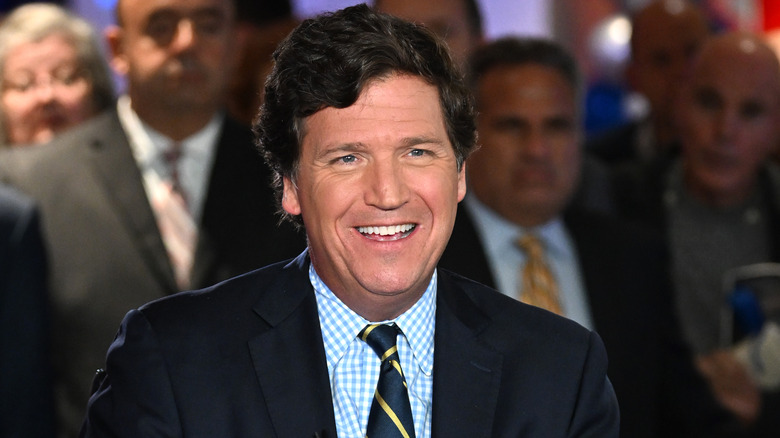 Tucker Carlson smiling