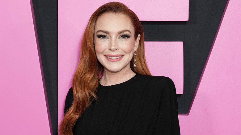 Lindsay Lohan smiling on red carpet