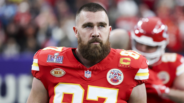 Travis Kelce frowning on football field