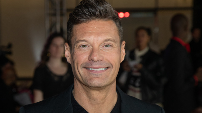 Ryan Seacrest posing