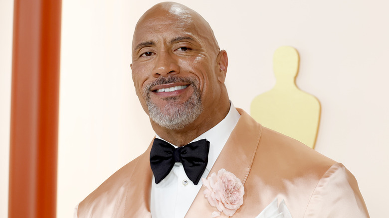 Dwayne Johnson in salmon tux