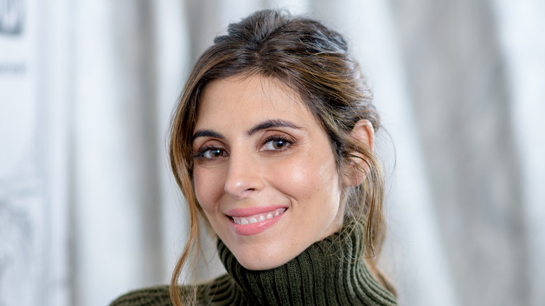 Jamie-Lynn Sigler poses in turtleneck 