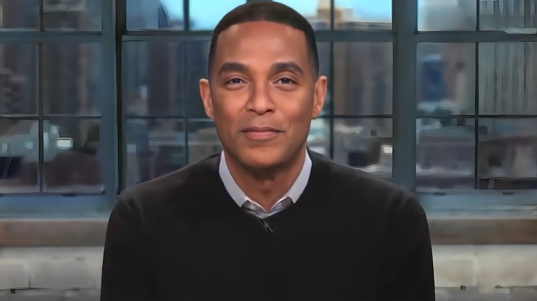 Don Lemon sitting at a desk